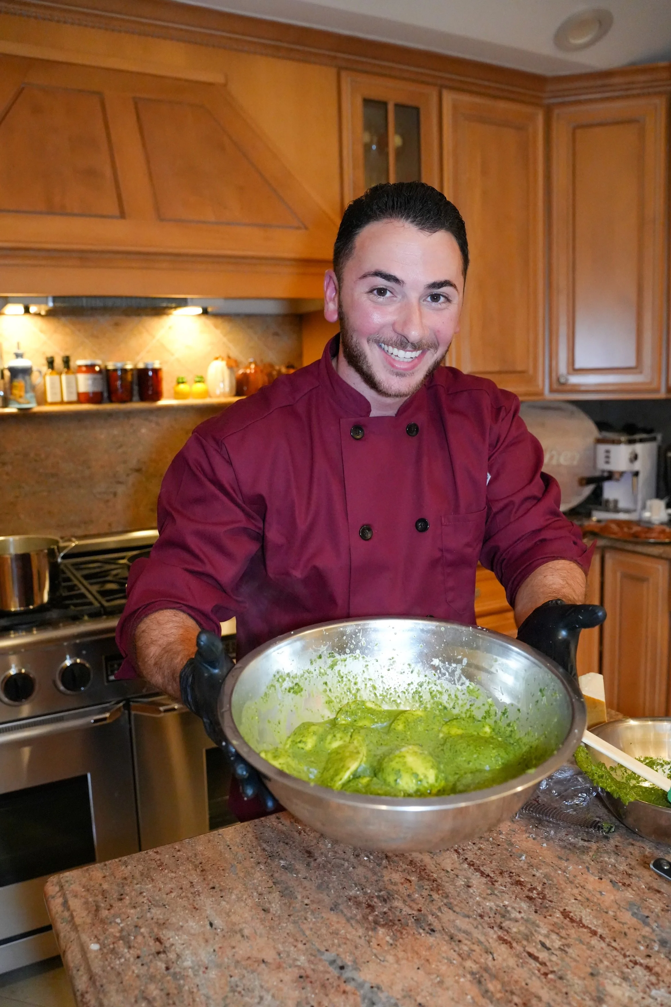 Chef Chris with delicious pesto and ravioli