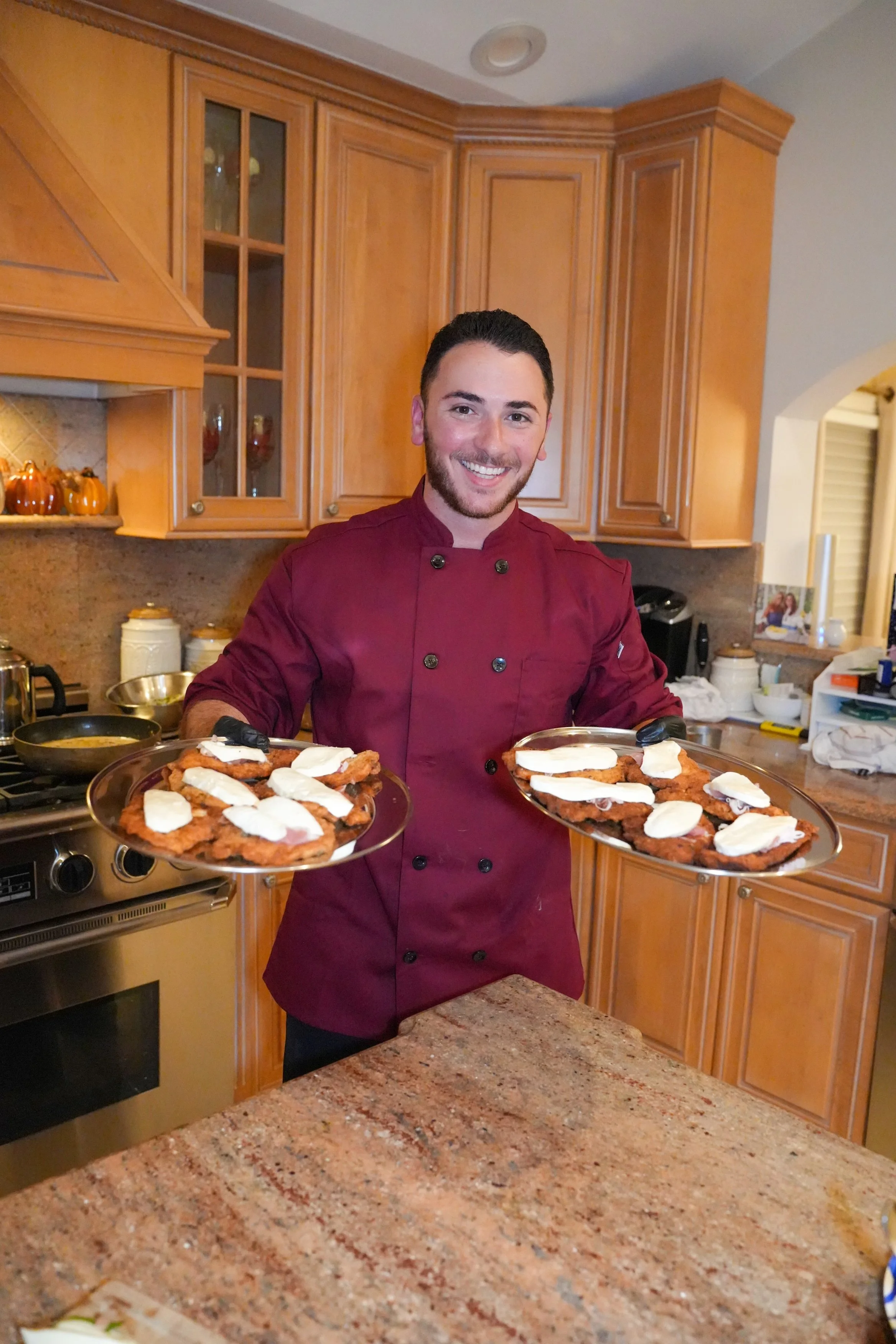 Chef Chris with delicious plate of veal valdostano